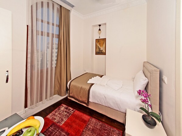 Chambre Simple Standard | Minibar, coffres-forts dans les chambres, chambres insonorisées