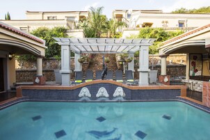 Outdoor pool, open 7:00 AM to 9:00 PM, pool umbrellas, sun loungers