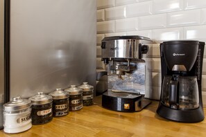 Fridge, microwave, stovetop, cookware/dishes/utensils