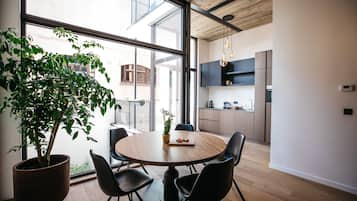 Luxe loft | Woonruimte | Flatscreentelevisie