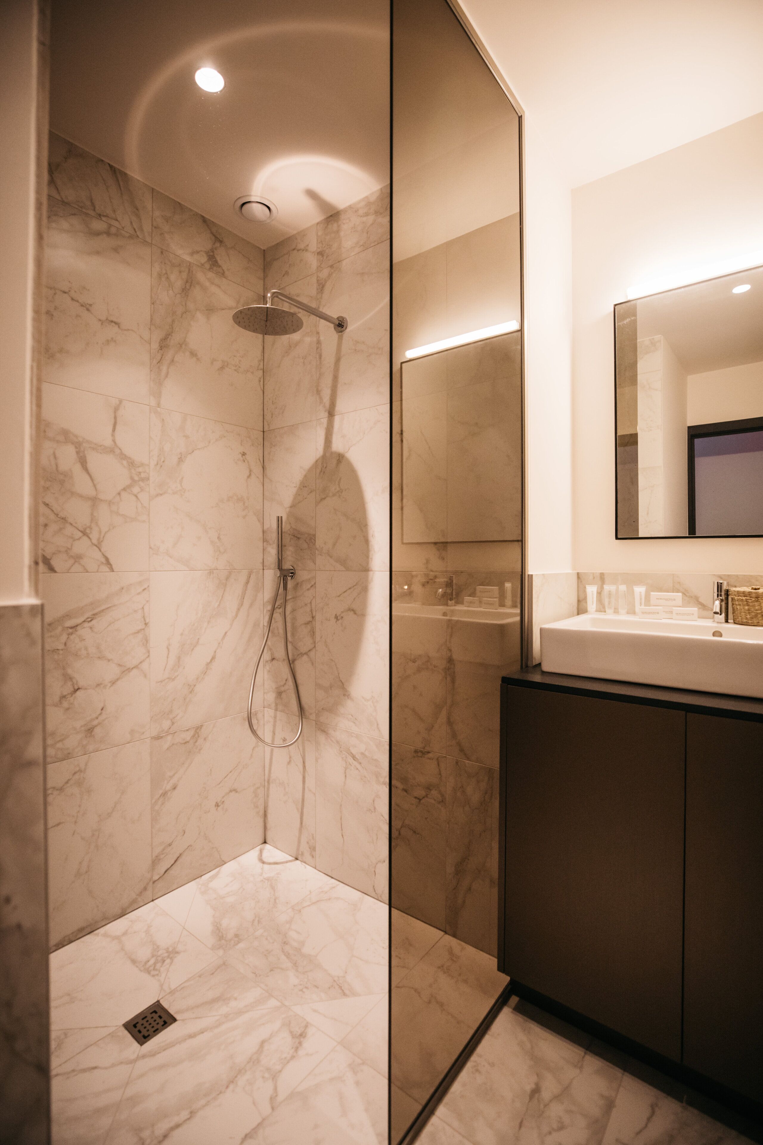 Luxury Loft | Bathroom | Shower, rainfall showerhead, designer toiletries, hair dryer