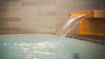 Separate tub and shower, free toiletries, hair dryer, slippers
