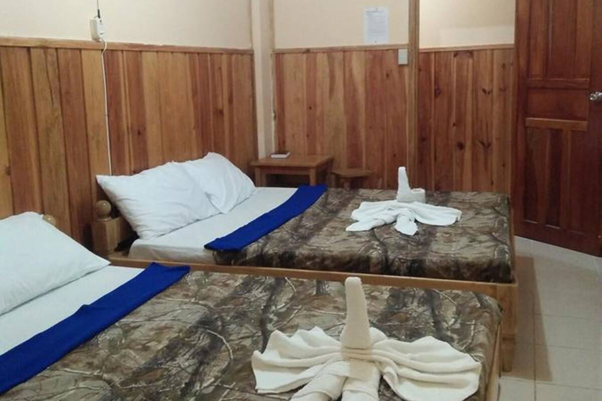 Family Room, Private Bathroom | Desk, bed sheets