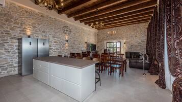 Villa | Private kitchen | Full-size fridge, oven, stovetop, dishwasher