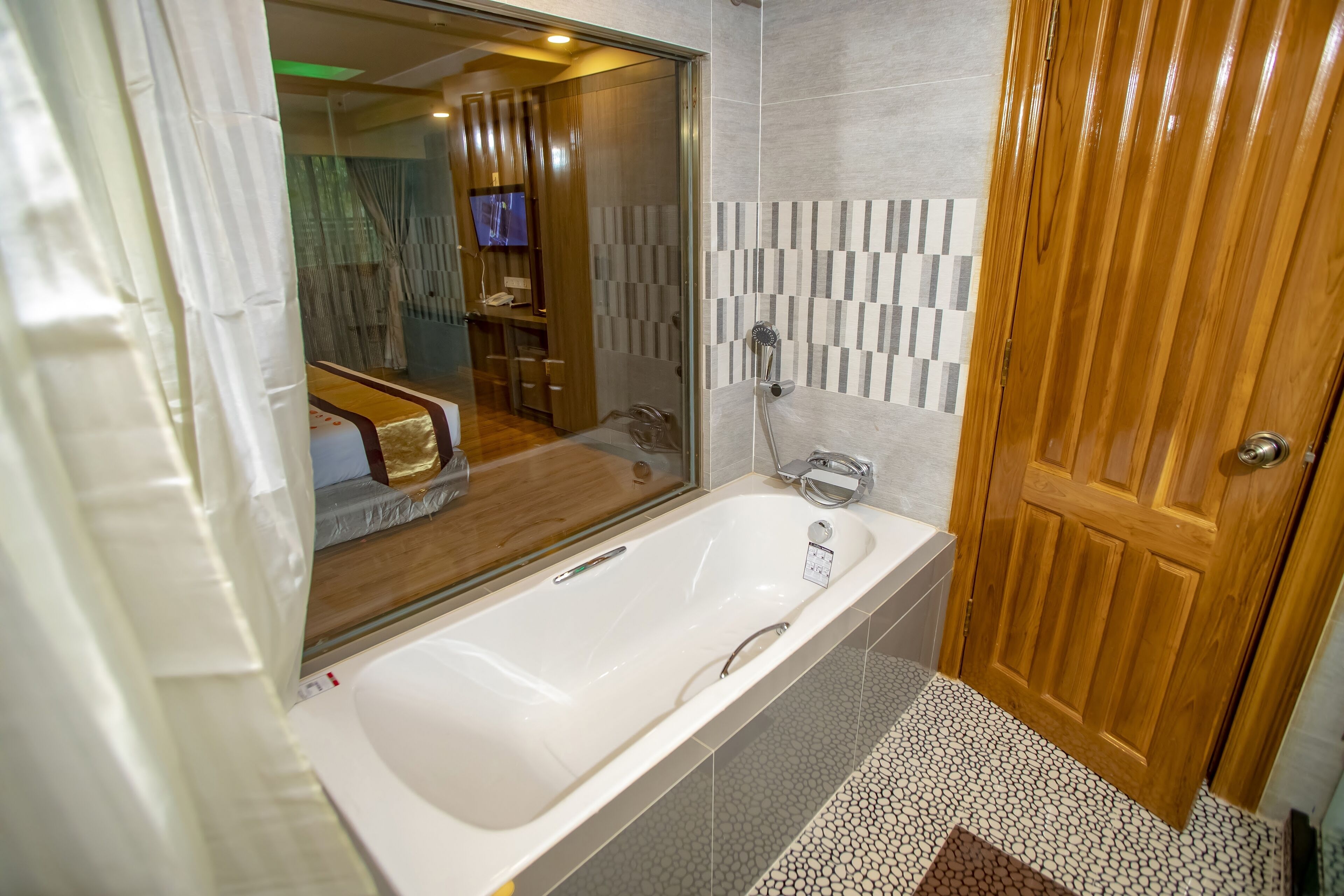 premier deluxe room | bathroom | separate bathtub and shower, free toiletries, hair dryer, bathrobes
