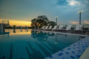 Outdoor pool, open 7:00 AM to 10:00 PM, sun loungers