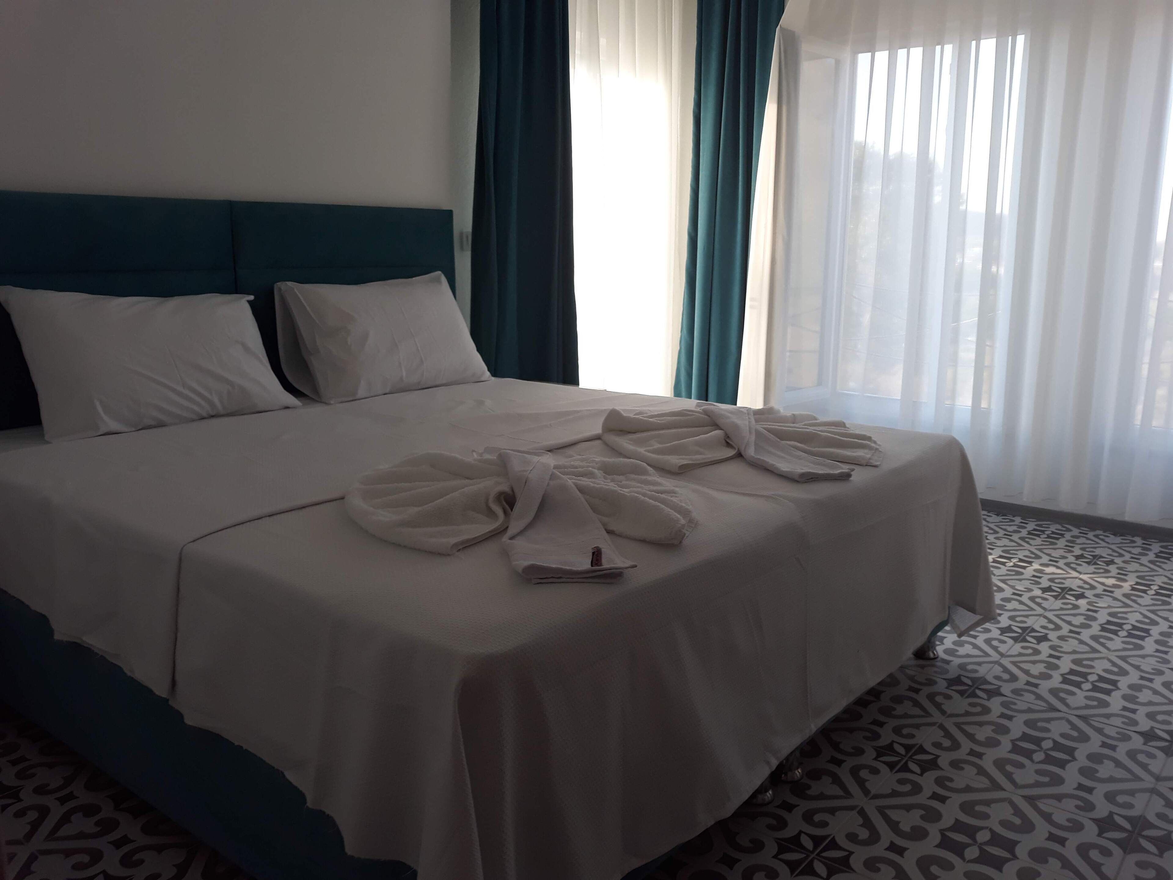 luxury double room, 1 double bed, lanai, sea view | egyptian cotton sheets, premium bedding, down duvets, minibar