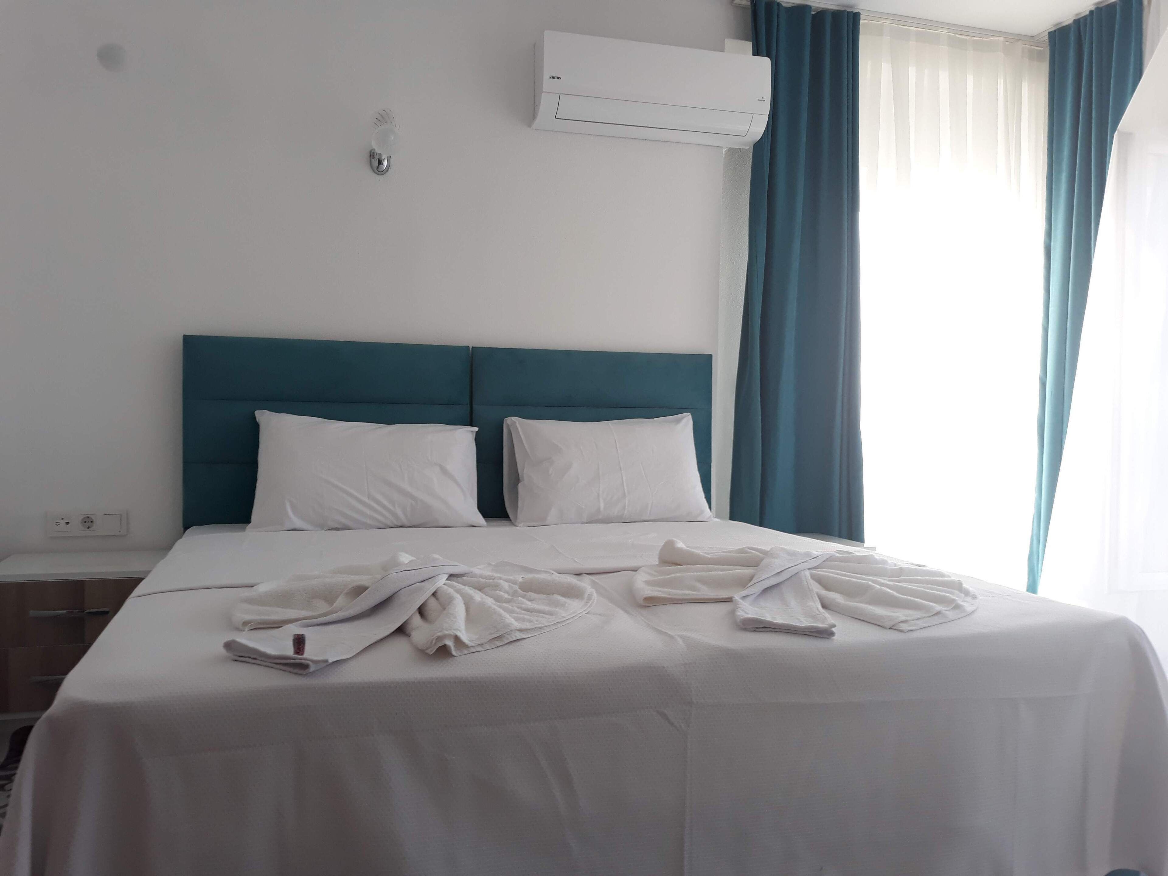 egyptian cotton sheets, premium bedding, down duvets, minibar