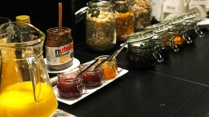 A breakfast buffet with various food items and condiments. -  Lidingö Arena Hotel (Lidingo)