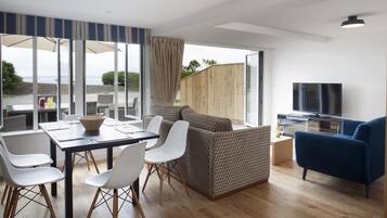 Two-Bedroom Lodge | Living area | Flat-screen TV
