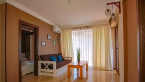 Apartment, 1 Bedroom | Laptop workspace, blackout curtains, free WiFi, bed sheets - Eden Garden by Mgzavrebi (Batumi)