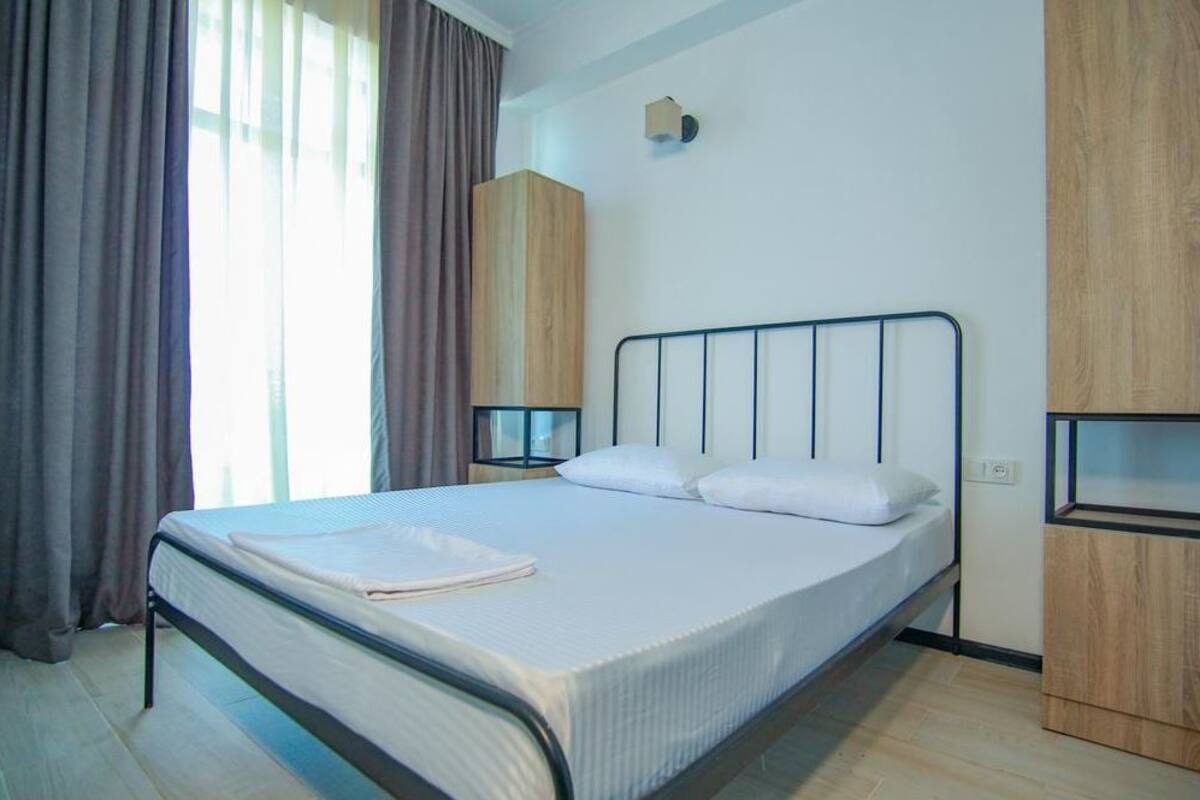 Apartamento superior | Espacio para trabajar con un portátil, cortinas opacas, wifi gratis