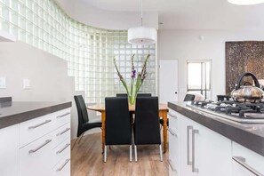 Coffee/tea maker, fridge, microwave, oven