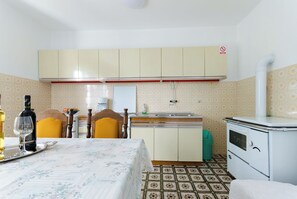 Apartment (A1) | Private kitchen | Fridge, stovetop, espresso maker, toaster - Apartment Josip (Senj)