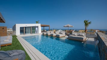 Outdoor pool, pool umbrellas, pool loungers