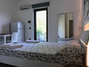 Double Room, Garden View | Blackout drapes, bed sheets