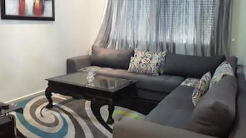 Appartement Supérieur, 2 chambres | Coin séjour | Télévision à écran plat