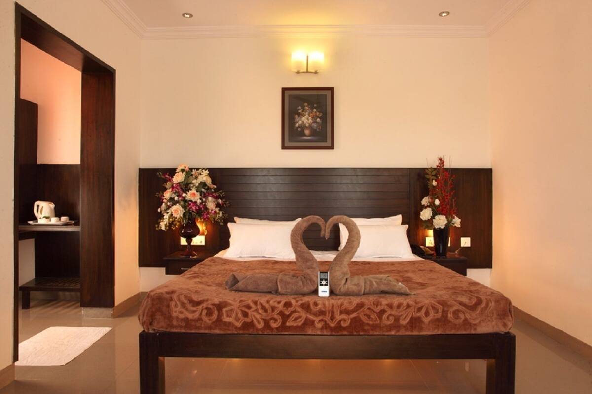 Suite Deluxe | 1 habitación, camas extra y ropa de cama
