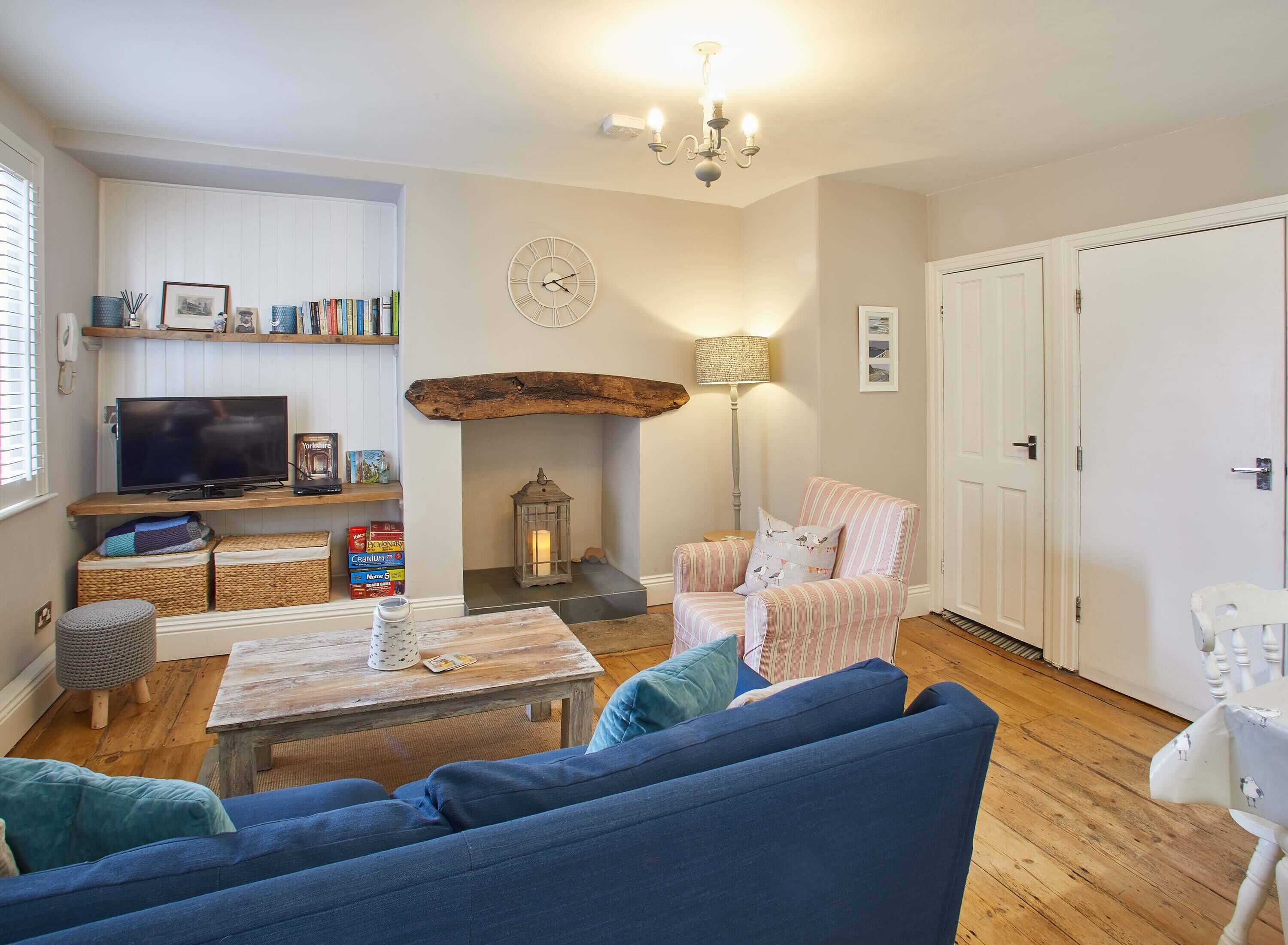 Two-Bedroom Apartment | Living area | Flat-screen TV