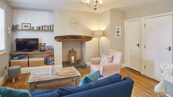Two-Bedroom Apartment | Living area | Flat-screen TV