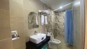 Single Room | Bathroom | Shower, free toiletries, hair dryer, slippers