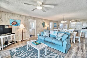 Una televisión, un reproductor de DVD, un reproductor estéreo