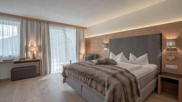 Chambre Deluxe | Literie hypoallergénique, coffres-forts dans les chambres