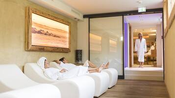 Relax in serene surroundings with three reclining chairs and a peaceful ambiance.