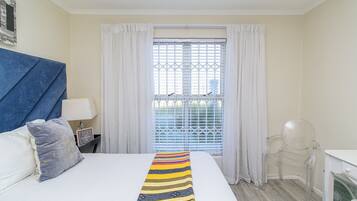 Luxury Apartment, Garden View (Beachfront) | 2 bedrooms, premium bedding, in-room safe, laptop workspace