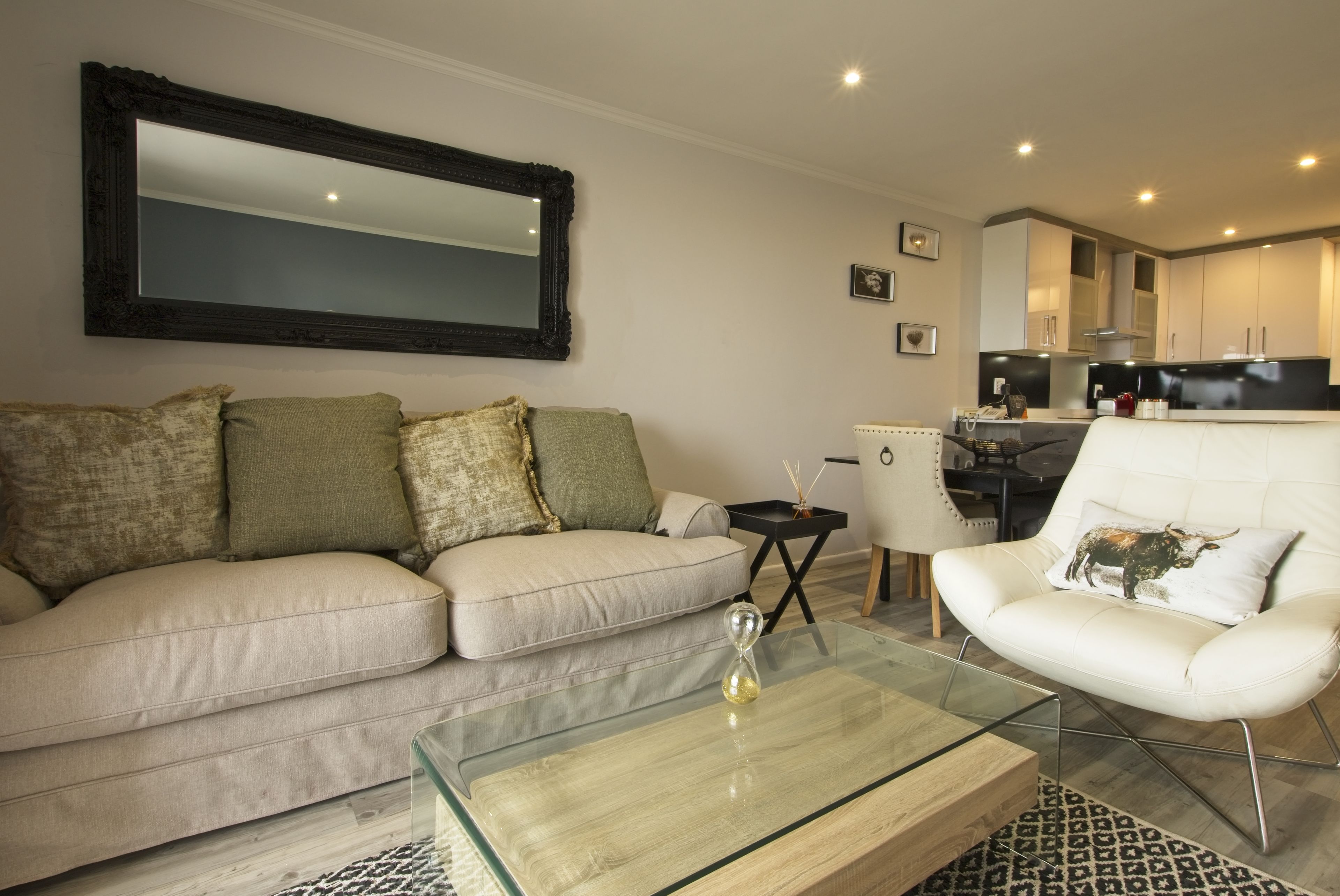 Luxury Apartment (Beachfront) | Living area | Flat-screen TV, DVD player