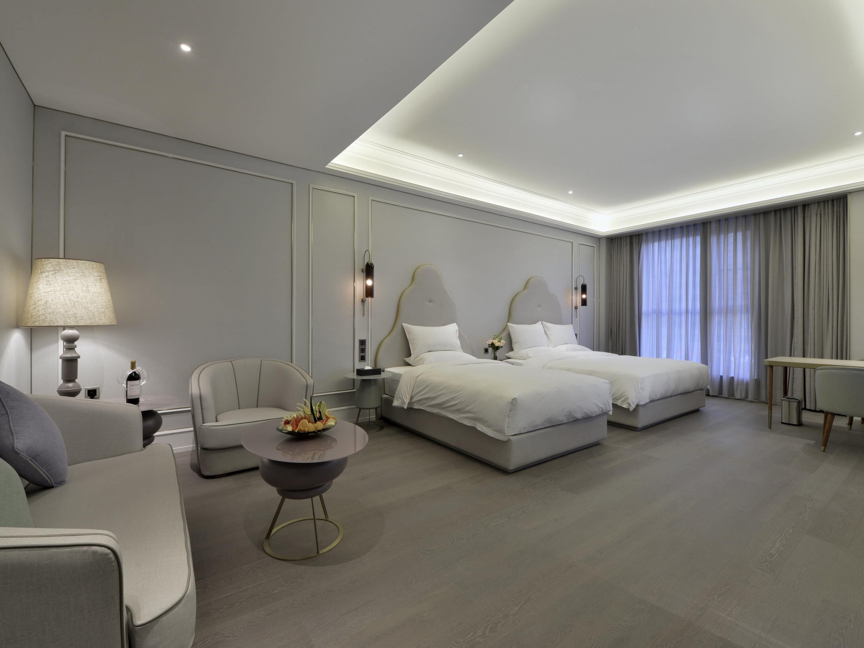 Family Room | Free minibar, in-room safe, desk, blackout drapes