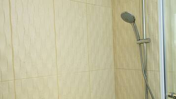 Shower, rainfall showerhead, hair dryer, towels