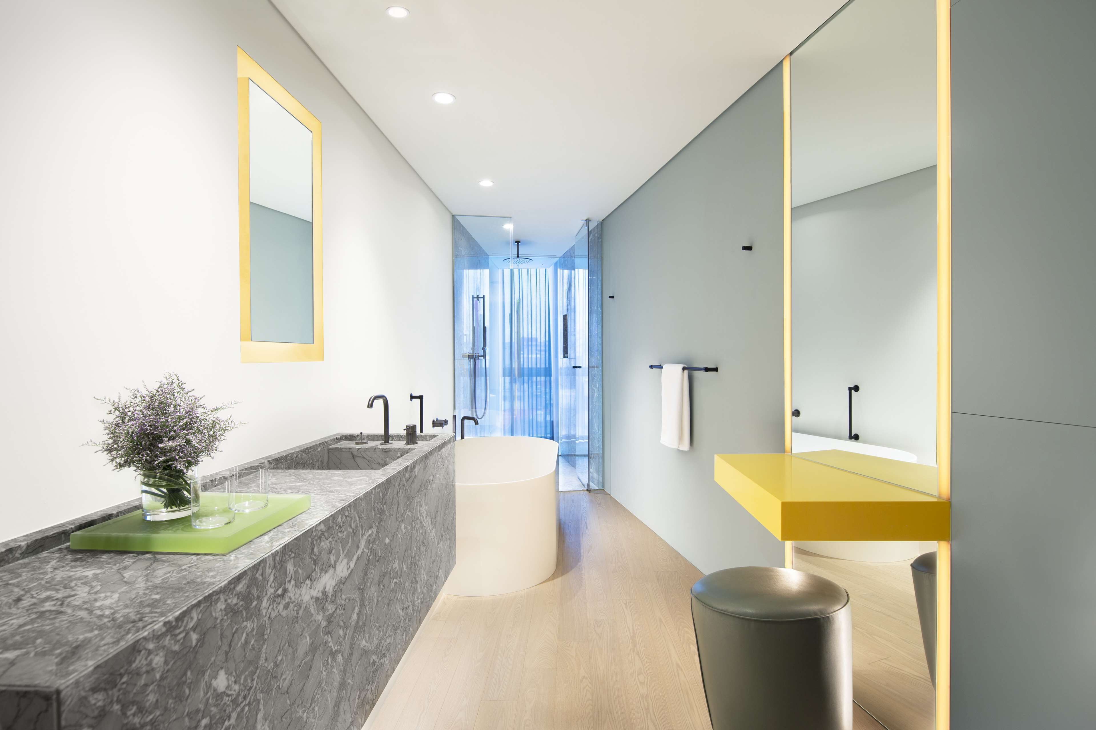 designer toiletries, hair dryer, bathrobes, slippers