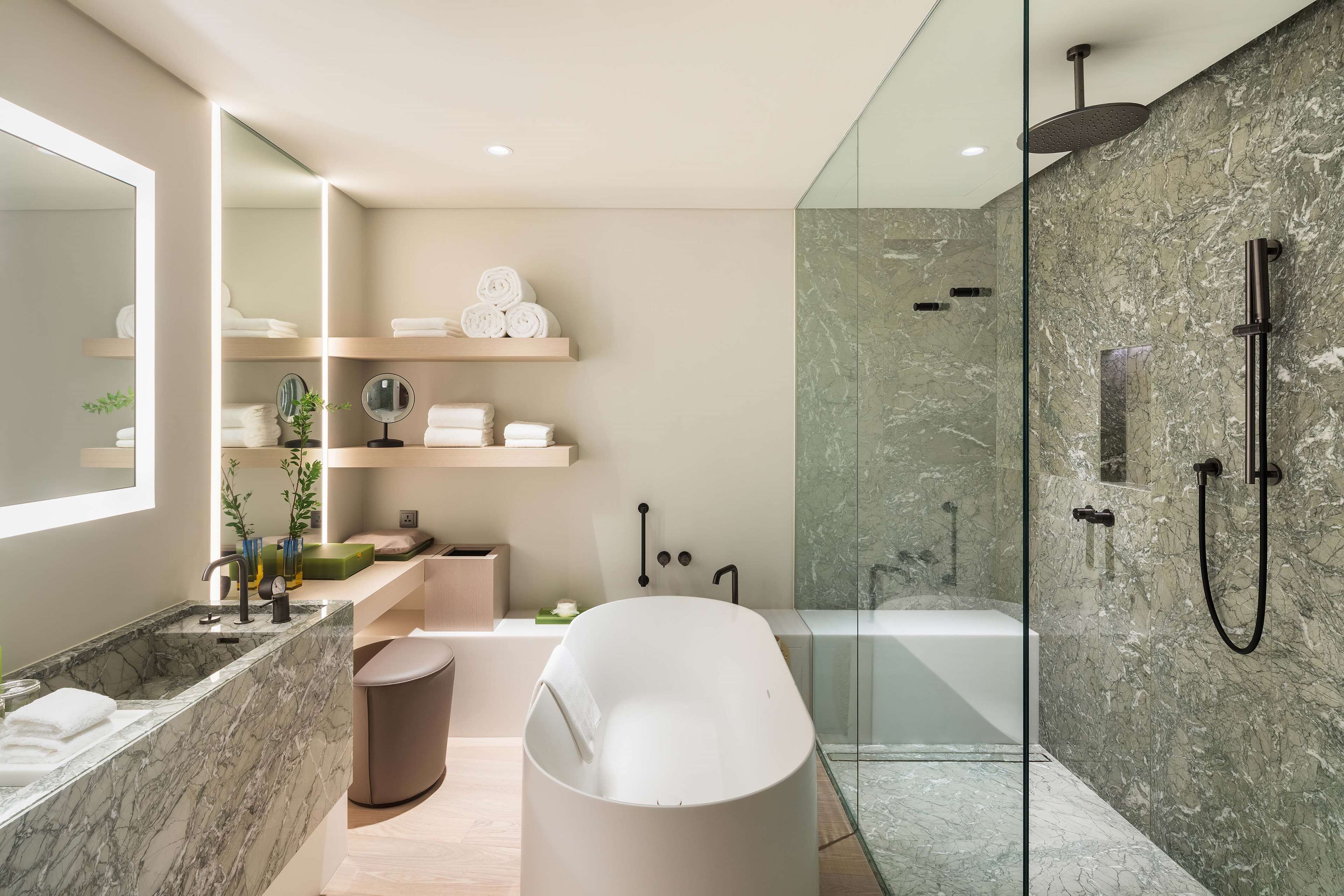 designer toiletries, hair dryer, bathrobes, slippers