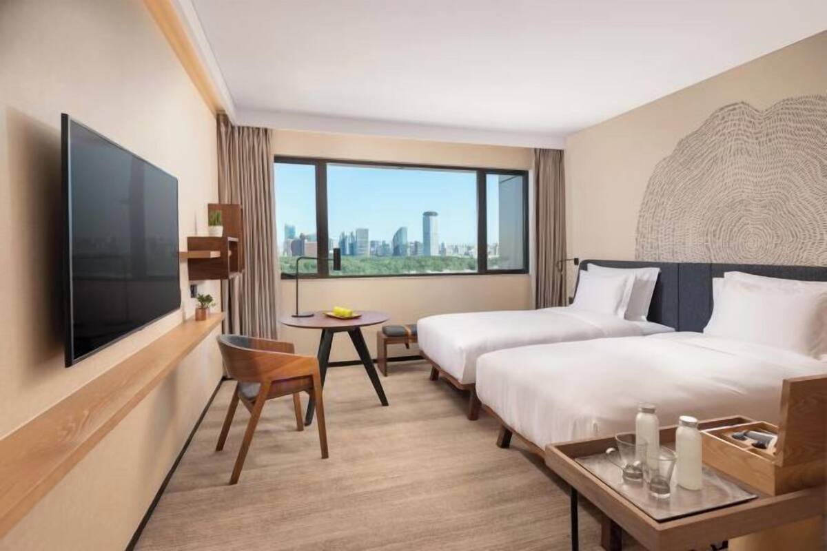 Premium bedding, down comforters, pillowtop beds, in-room safe