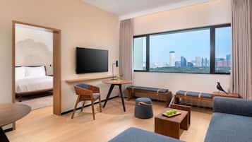 Premium bedding, down comforters, pillowtop beds, in-room safe