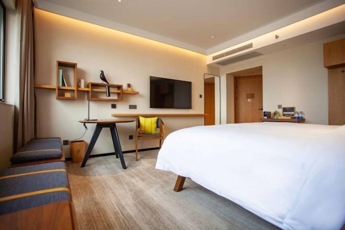 Premium bedding, down comforters, pillowtop beds, in-room safe