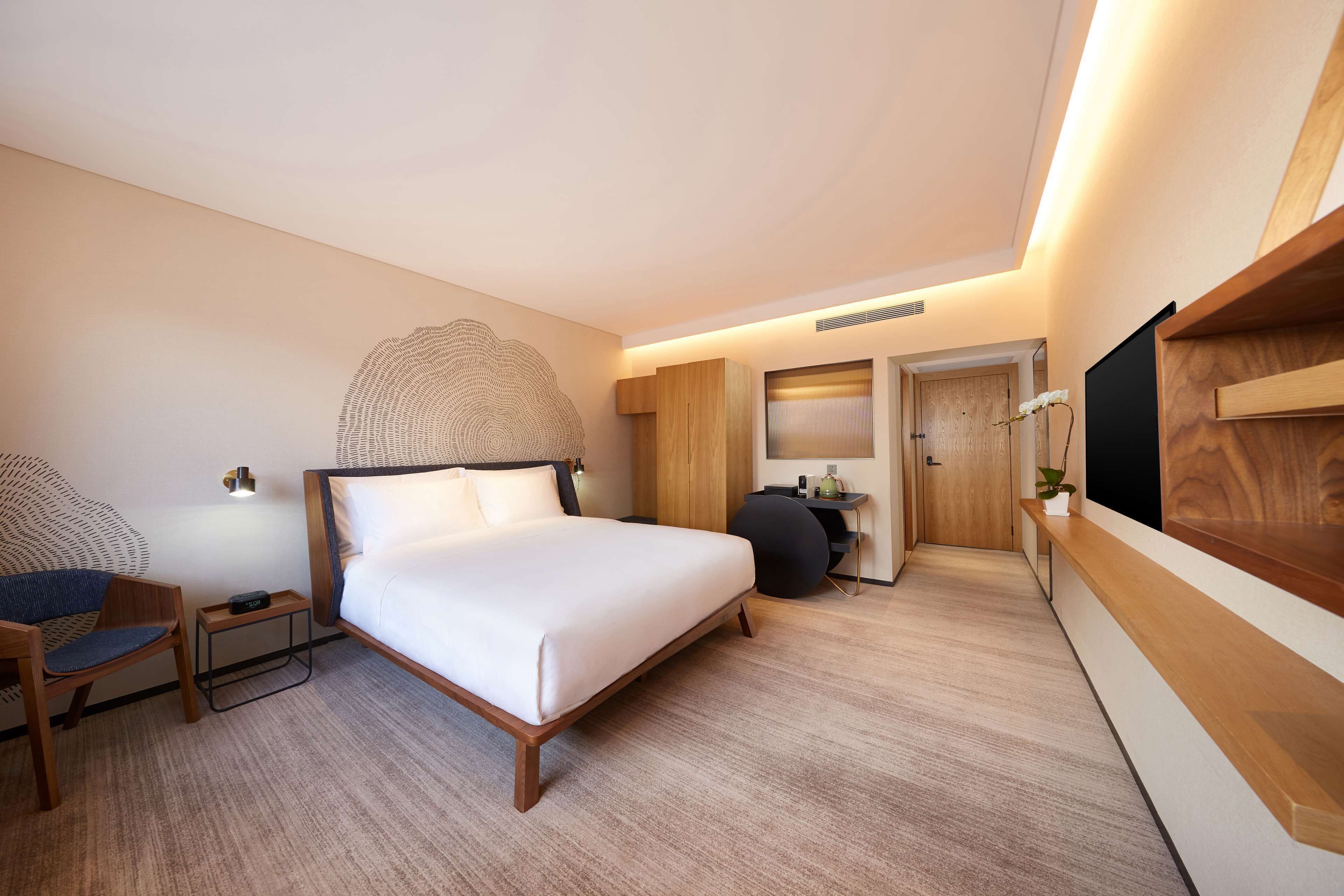 Premium bedding, down comforters, pillowtop beds, in-room safe