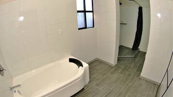 Shower, rainfall showerhead, hair dryer, towels
