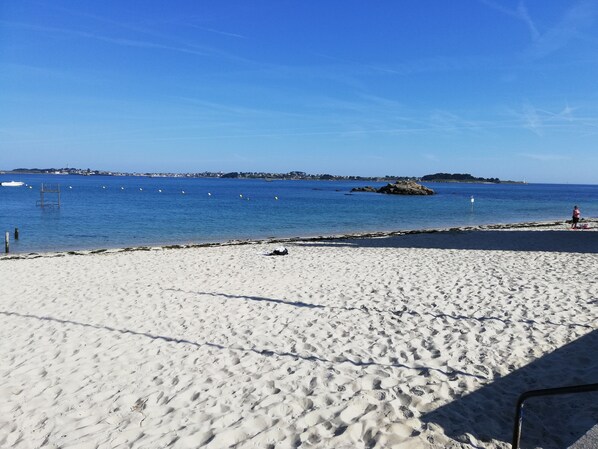 On the beach, sun loungers
