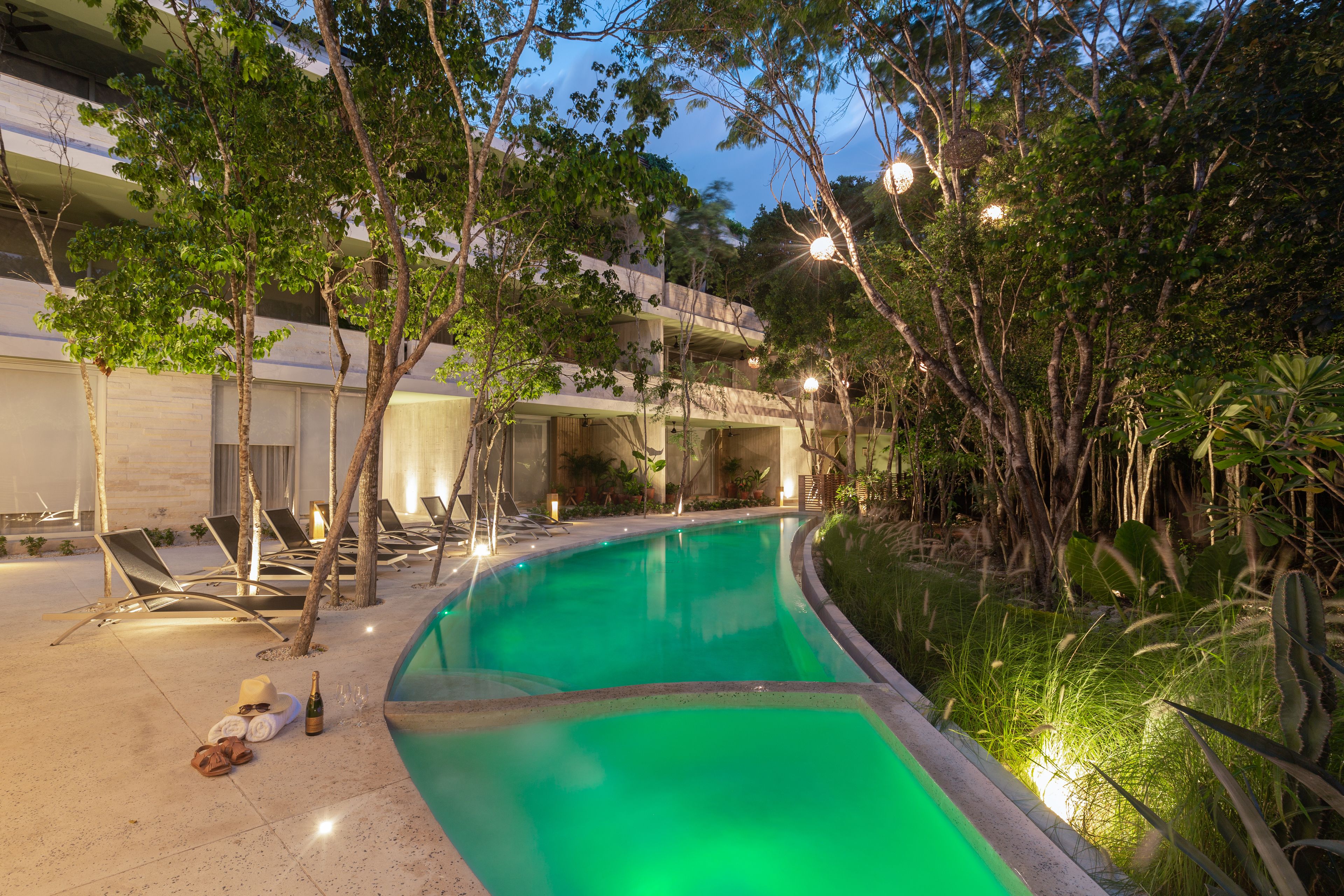 Outdoor pool, open 8:00 AM to 10:00 PM, sun loungers