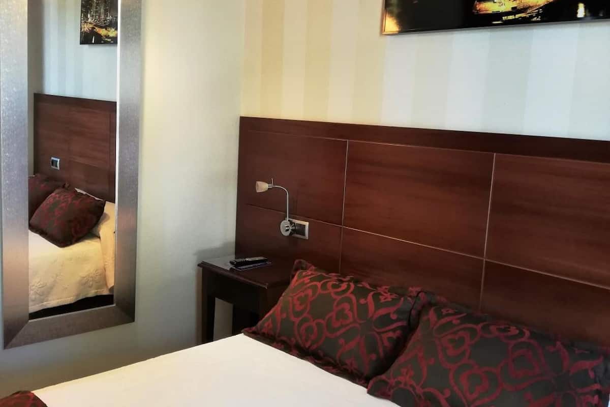 minibar, desk, laptop workspace, blackout curtains