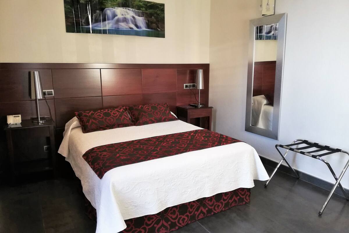 minibar, desk, laptop workspace, blackout curtains