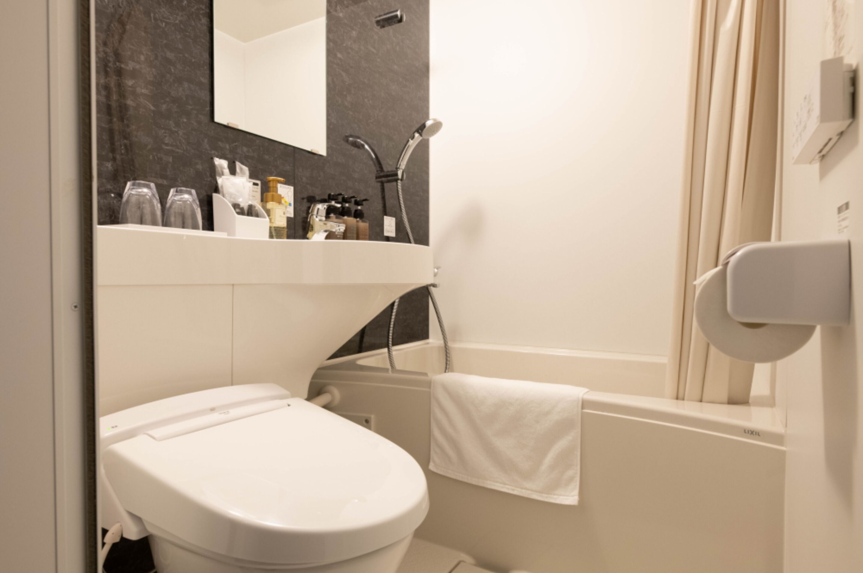 free toiletries, hair dryer, slippers, bidet