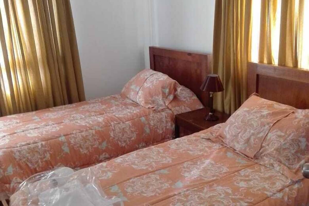 Twin Room | Blackout drapes, soundproofing, iron/ironing board (on request)