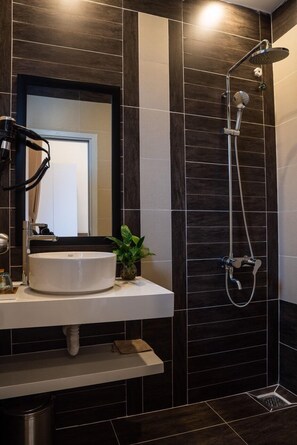 Shower, free toiletries, hair dryer, slippers