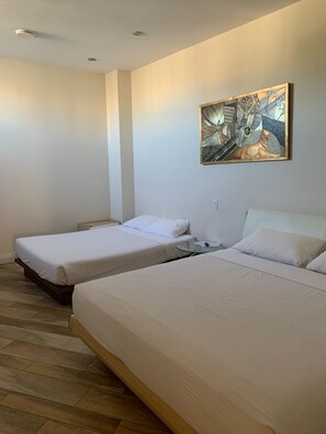 Deluxe 2 Queen Beds | Bathroom | Shower, towels - Dragon Gate Inn (Toronto)