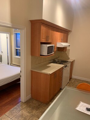 Habitación | Tabla de planchar con plancha, wifi gratis y ropa de cama 