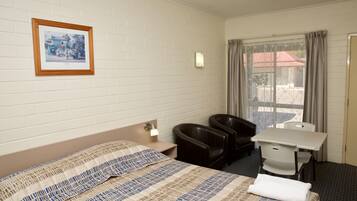 Habitación Deluxe doble | Escritorio, sistema de insonorización, wifi gratis y ropa de cama