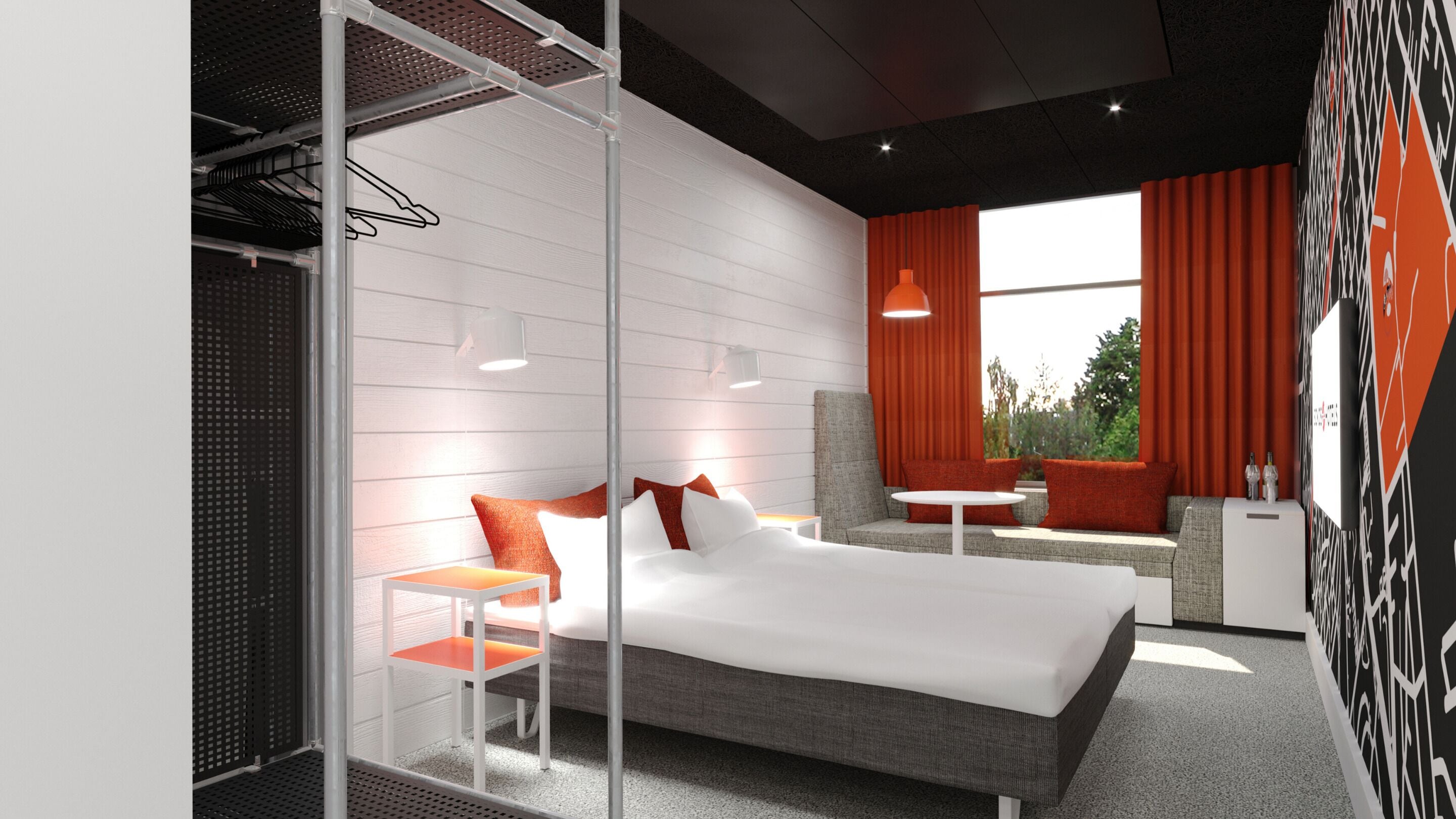 Een moderne hotelkamer met een groot bed, een zithoek met een tafel en uitzicht op groen.